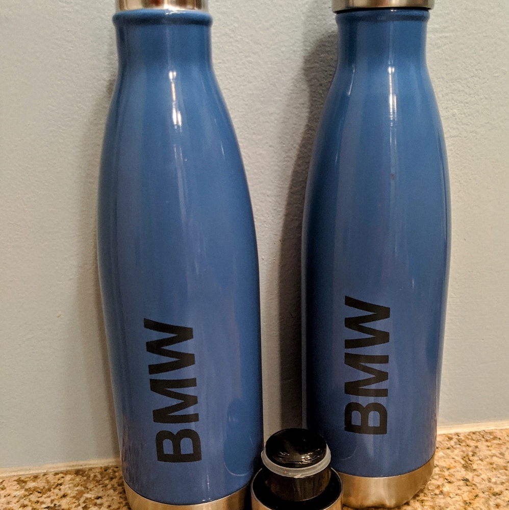 Two BMW stainless beverage holder